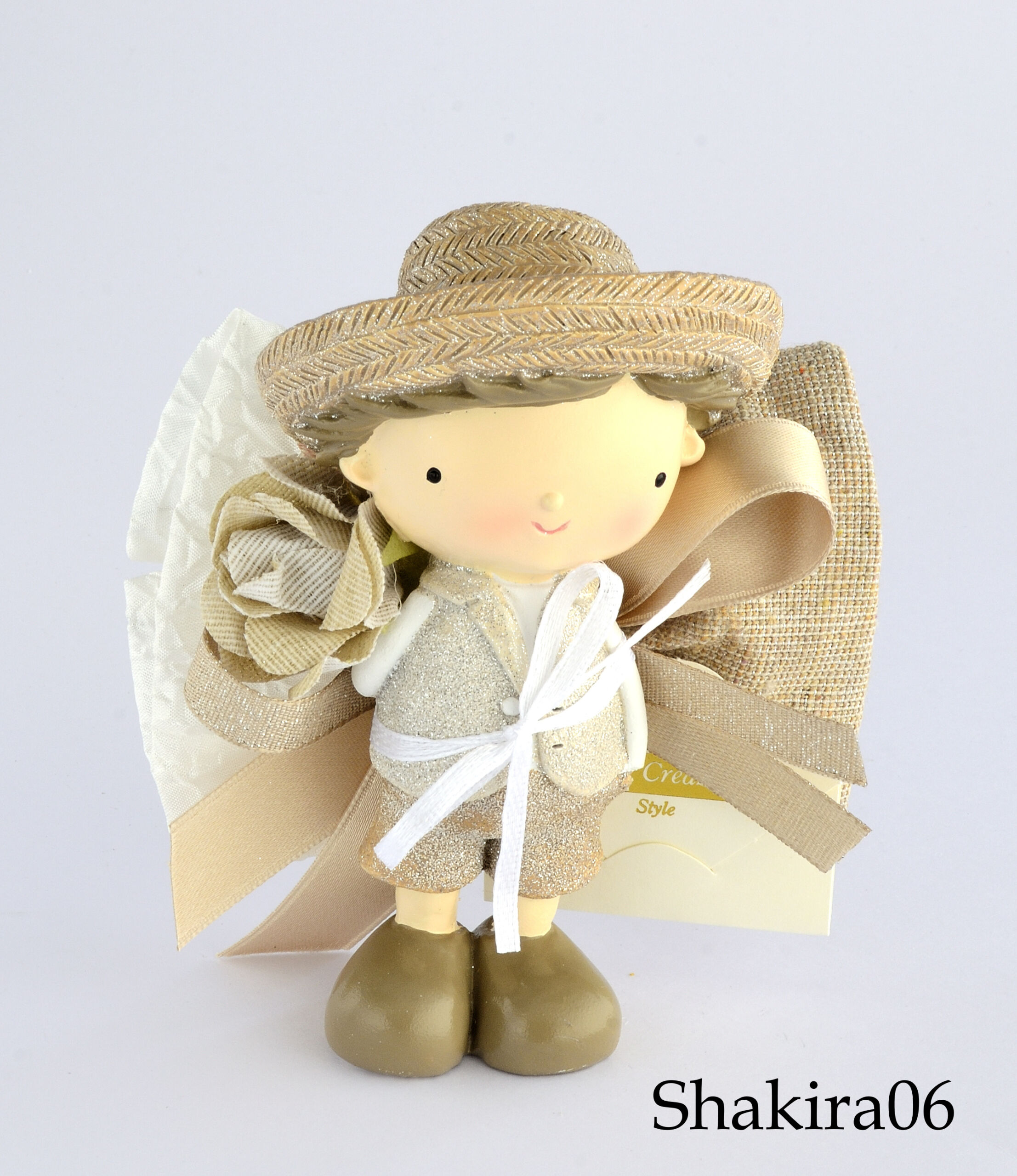 SACCHETTO CON BIMBO (H .11,5) SHAKIRA SACCHETTO CON BIMBO (H .11,5) SHAKIRA