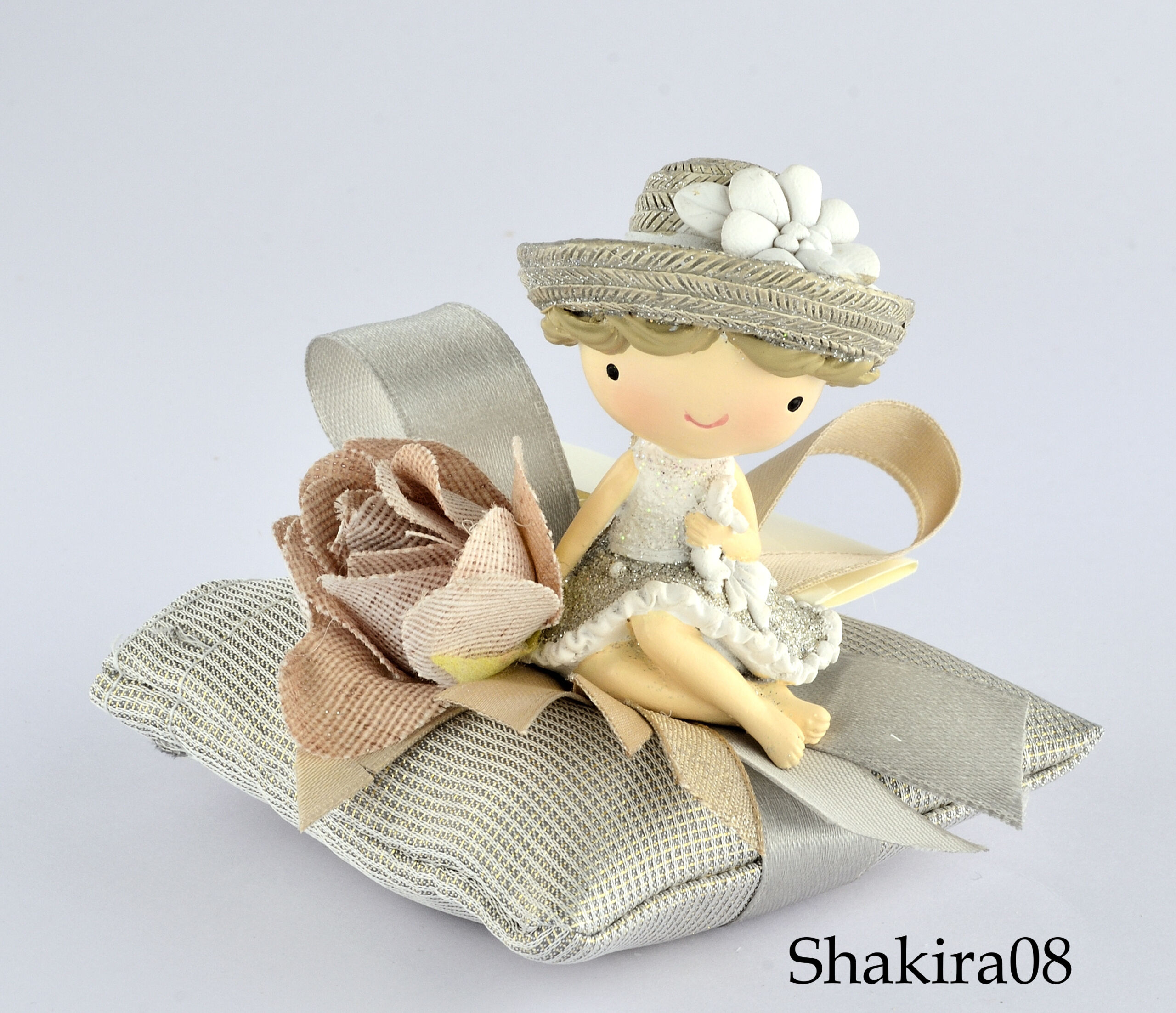 CUSCINO CON BIMBA (CM 7,5X7,5XH. 7,5) SHAKIRA CUSCINO CON BIMBA (CM 7,5X7,5XH. 7,5) SHAKIRA